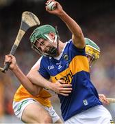 3 July 2022; Sam O'Farrell of Tipperary in action against Daniel Hand during the Electric Ireland GAA Hurling All-Ireland Minor Championship Final match between Tipperary and Offaly at UPMC Nowlan Park, Kilkenny. Photo by Matt Browne/Sportsfile