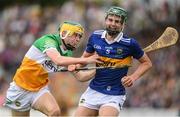 3 July 2022; Sam O'Farrell of Tipperary in action against Daniel Hand during the Electric Ireland GAA Hurling All-Ireland Minor Championship Final match between Tipperary and Offaly at UPMC Nowlan Park, Kilkenny. Photo by Matt Browne/Sportsfile