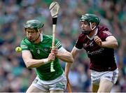 3 July 2022; William O'Donoghue of Limerick in action against Cathal Mannion of Galway during the GAA Hurling All-Ireland Senior Championship Semi-Final match between Limerick and Galway at Croke Park in Dublin. Photo by Piaras Ó Mídheach/Sportsfile