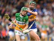 3 July 2022; Adam Screeney of Offaly in action against Sam O'Farrell of Tipperary during the Electric Ireland GAA Hurling All-Ireland Minor Championship Final match between Tipperary and Offaly at UPMC Nowlan Park, Kilkenny. Photo by Matt Browne/Sportsfile