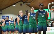 3 July 2022; Aidan Harris Igiehon of Ireland and teammates during the playing of the National Anthem before the FIBA EuroBasket 2025 Pre-Qualifier First Round Group A match between Ireland and Switzerland at National Basketball Arena in Dublin. Photo by Ramsey Cardy/Sportsfile