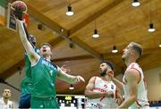 3 July 2022; Taiwo Badmus, left, and Adrian O'Sullivan of Ireland in action against Selim Fofana, left, and Killian Martin of Switzerland during the FIBA EuroBasket 2025 Pre-Qualifier First Round Group A match between Ireland and Switzerland at National Basketball Arena in Dublin. Photo by Ramsey Cardy/Sportsfile