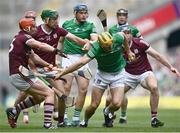 3 July 2022; Dan Morrissey of Limerick is tackled by Galway players, from left, Conor Whelan, Brian Concannon and Conor Cooney during the GAA Hurling All-Ireland Senior Championship Semi-Final match between Limerick and Galway at Croke Park in Dublin. Photo by David Fitzgerald/Sportsfile