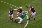 3 July 2022; Peter Casey of Limerick in action against Galway players, left to right, Jack Grealish, Darren Morrissey, and Pádraic Mannion during the GAA Hurling All-Ireland Senior Championship Semi-Final match between Limerick and Galway at Croke Park in Dublin. Photo by Daire Brennan/Sportsfile