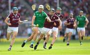 3 July 2022; Kyle Hayes of Limerick in action against Galway players, from left, Conor Cooney, Cathal Mannion and Padraic Mannion during the GAA Hurling All-Ireland Senior Championship Semi-Final match between Limerick and Galway at Croke Park in Dublin. Photo by Stephen McCarthy/Sportsfile