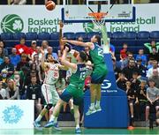 3 July 2022; Arnaud Cotture, left, and Selim Fofana of Switzerland in action against Jordan Blount, left, and Will Hanley of Ireland during the FIBA EuroBasket 2025 Pre-Qualifier First Round Group A match between Ireland and Switzerland at National Basketball Arena in Dublin. Photo by Ramsey Cardy/Sportsfile