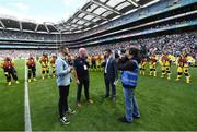 3 July 2022; Antrim hurler Neil McManus, left, Coxswain Paddy McLaughlin, centre, and MC Paul Collins along with the Volunteer Lifeboat crew from around Ireland promote the RNLI’s drowning prevention partnership with the GAA on the pitch at Croke Park during the GAA Hurling All-Ireland Senior Championship Semi-Final between Limerick and Galway. Photo by David Fitzgerald/Sportsfile