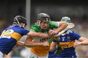 3 July 2022; Dan Ravenhill of Offaly in action against Cathal English and Chris O'Donnell of Tipperary during the Electric Ireland GAA Hurling All-Ireland Minor Championship Final match between Tipperary and Offaly at UPMC Nowlan Park, Kilkenny. Photo by Matt Browne/Sportsfile