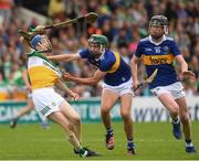 3 July 2022; Leigh Kavanagh of Offaly in action against Sam O'Farrell of Tipperary during the Electric Ireland GAA Hurling All-Ireland Minor Championship Final match between Tipperary and Offaly at UPMC Nowlan Park, Kilkenny. Photo by Matt Browne/Sportsfile