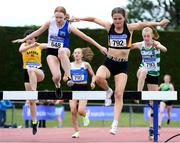3 July 2022; Sinead Walsh of Tullamore Harriers A.C., left, and Eleanor Foot of Bray Runners A.C. competing in the Girl's U18 2000m Steeplechase during day one of the Irish Life Health National Juvenile Track and Field Championships at Tullamore in Offaly. Photo by George Tewkesbury/Sportsfile