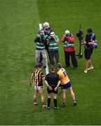 2 July 2022; Captains Richie Reid of Kilkenny and Tony Kelly of Clare with referee Fergal Horgan ahead of the GAA Hurling All-Ireland Senior Championship Semi-Final match between Kilkenny and Clare at Croke Park in Dublin. Photo by Daire Brennan/Sportsfile