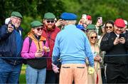 4 July 2022; Actor Bill Murray hands a hot dog to a fan during day one of the JP McManus Pro-Am at Adare Manor Golf Club in Adare, Limerick. Photo by Ramsey Cardy/Sportsfile
