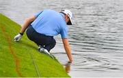 4 July 2022; Westlife member Kian Egan searches for his ball on the seventh green during day one of the JP McManus Pro-Am at Adare Manor Golf Club in Adare, Limerick. Photo by Ramsey Cardy/Sportsfile