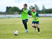 4 July 2022; Seámie Whelan, left, and Noah Kenny during the INTERSPORT Elverys FAI Summer Soccer Schools at Curracloe United FC in Ballaghablake, Wexford. Photo by Piaras Ó Mídheach/Sportsfile