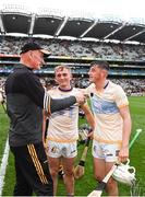 2 July 2022; Kilkenny manager Brian Cody speaks with his players Mikey Butler, centre, and Cian Kenny after their side's victory in the GAA Hurling All-Ireland Senior Championship Semi-Final match between Kilkenny and Clare at Croke Park in Dublin. Photo by Harry Murphy/Sportsfile