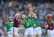 3 July 2022; Aoife Power, Ballygunner NS, Waterford, and Saoirse Maher, Kiladangan NS, Glebe, Nenagh, Tipperary, right, both representing Limerick, with Isabelle Lambert, St Brigid's NS, Castleknock, Dublin, representing Galway, during the INTO Cumann na mBunscol GAA Respect Exhibition Go Games during the GAA Hurling All-Ireland Senior Championship Semi-Final match between Limerick and Galway at Croke Park in Dublin. Photo by Stephen McCarthy/Sportsfile