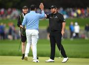 4 July 2022; Shane Lowry of Ireland celebrates a putt with Abdulla Al Naboodah during day one of the JP McManus Pro-Am at Adare Manor Golf Club in Adare, Limerick. Photo by Eóin Noonan/Sportsfile