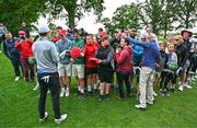 5 July 2022; Jordan Speith of USA and former jockey Ruby Walsh sign autographs and pose for photographs during day two of the JP McManus Pro-Am at Adare Manor Golf Club in Adare, Limerick. Photo by Eóin Noonan/Sportsfile