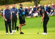 5 July 2022; Danny Willett of England putts on the 16th green as Former jockey's AP McCoy, left, Johnny Murtagh watch on during day two of the JP McManus Pro-Am at Adare Manor Golf Club in Adare, Limerick. Photo by Ramsey Cardy/Sportsfile