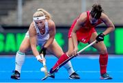 5 July 2022; Caoimhe Perdue of Ireland in action against Paula Valdivia of Chile during the FIH Women's Hockey World Cup Pool A match between Ireland and Chile at Wagener Stadium in Amstelveen, Netherlands. Photo by Patrick Goosen/Sportsfile