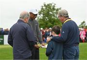 5 July 2022; Tiger Woods of USA signs an autograph for a grandson of JP McManus during day two of the JP McManus Pro-Am at Adare Manor Golf Club in Adare, Limerick. Photo by Ramsey Cardy/Sportsfile