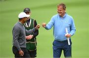 5 July 2022; Peter Jones celebrates with Tiger Woods of USA on the 1st green during day two of the JP McManus Pro-Am at Adare Manor Golf Club in Adare, Limerick. Photo by Ramsey Cardy/Sportsfile