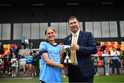 5 July 2022; Dublin North captain Anna Watson accepts the cup from LGFA president Micheál Naughton during the LGFA National Under 17 Player Development Programme Festival Day at the GAA National Games Development Centre in Abbotstown, Dublin. Photo by David Fitzgerald/Sportsfile