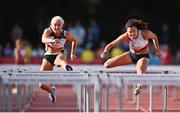 5 July 2022; Jade Barber of USA, right, on her way to winning the O'Leary Insurance 100m Hurdles Women Race 2, ahead of Sarah Lavin of Ireland, left, who finished second, during the BAM Cork City Sports at Munster Technological University Athletics Stadium in Bishopstown, Cork. Photo by Sam Barnes/Sportsfile