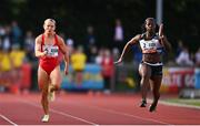 5 July 2022; Kristal Awuah of Great Britain, right, on her way to winning the Centra Women's 100m, ahead of Molly Scott of Ireland, left, who finished second, during the BAM Cork City Sports at Munster Technological University Athletics Stadium in Bishopstown, Cork. Photo by Sam Barnes/Sportsfile