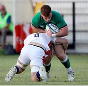 5 July 2022; James McCormick of Ireland is tackled by Ethan Staddon of England during the Six Nations U20 summer series match between Ireland and England at Payanini Centre in Verona, Italy. Photo by Roberto Bregani/Sportsfile