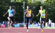 5 July 2022; Israel Olatunde of Ireland, centre, on his way to winning the SuperValu Men's 100m Race 2, ahead of Sam Gordon of Great Britain, left, who finished second, and Henrico Bruintjies of South Africa, who finished third, during the BAM Cork City Sports at Munster Technological University Athletics Stadium in Bishopstown, Cork. Photo by Sam Barnes/Sportsfile