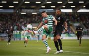 5 July 2022; Aaron Greene of Shamrock Rovers in action against Rodolfo Soares of Hibernians during the UEFA Champions League 2022/23 First Qualifying Round First Leg match between Shamrock Rovers and Hibernians at Tallaght Stadium in Dublin. Photo by Stephen McCarthy/Sportsfile