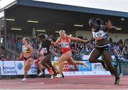 5 July 2022; Kristal Awuah of Great Britain, right, on her way to winning the Centra Women's 100m, ahead of Molly Scott of Ireland, second from right, who finished second, during the BAM Cork City Sports at Munster Technological University Athletics Stadium in Bishopstown, Cork. Photo by Sam Barnes/Sportsfile