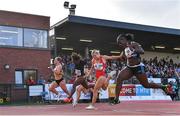 5 July 2022; Kristal Awuah of Great Britain, right, on her way to winning the Centra Women's 100m, ahead of Molly Scott of Ireland, second from right, who finished second, during the BAM Cork City Sports at Munster Technological University Athletics Stadium in Bishopstown, Cork. Photo by Sam Barnes/Sportsfile