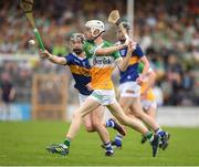 3 July 2022; Brecon Kavanagh of Offaly in action against Conor Martin of Tipperary during the Electric Ireland GAA Hurling All-Ireland Minor Championship Final match between Tipperary and Offaly at UPMC Nowlan Park, Kilkenny. Photo by Matt Browne/Sportsfile
