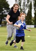 6 July 2022; Conor Liddy, aged 5, and his mother Nora in attendance during the 2022 Bank of Ireland Leinster Rugby Inclusion Camp at St Mary's College RFC in Dublin. Photo by Sam Barnes/Sportsfile