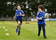 6 July 2022; Ed Fagan, aged 7, right, and Barra Thomas, aged 7, during the 2022 Bank of Ireland Leinster Rugby Inclusion Camp at St Mary's College RFC in Dublin. Photo by Sam Barnes/Sportsfile