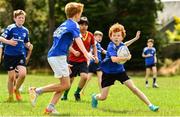 6 July 2022; Jason Drought, aged 11, right, and Tim Smyth, aged 12, during the 2022 Bank of Ireland Leinster Rugby Summer Camp at Wanderers FC in Dublin. Photo by Sam Barnes/Sportsfile