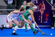 6 July 2022; Caoimhe Perdue of Ireland in action against Amelie Wortmann of Germany during the FIH Women's Hockey World Cup Pool A match between Ireland and Germany at Wagener Stadium in Amstelveen, Netherlands. Photo by Jeroen Meuwsen/Sportsfile