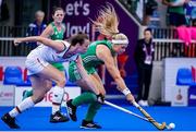 6 July 2022; Caoimhe Perdue of Ireland in action against Amelie Wortmann of Germany during the FIH Women's Hockey World Cup Pool A match between Ireland and Germany at Wagener Stadium in Amstelveen, Netherlands. Photo by Jeroen Meuwsen/Sportsfile