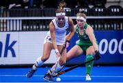 6 July 2022; Cecile Pieper of Germany in action against Naomi Carroll of Ireland during the FIH Women's Hockey World Cup Pool A match between Ireland and Germany at Wagener Stadium in Amstelveen, Netherlands. Photo by Jeroen Meuwsen/Sportsfile