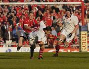 14 May 2004; Bryn Cunningham, Ulster, is tackled by Matthew Watkins, Llanelli. Celtic League 2003-2004, Round 21, Llanelli v Ulster, Stradey Park, Llanelli, Wales. Picture credit; Matt Browne / SPORTSFILE