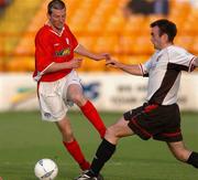 14 May 2004; Jim Crawford, Shelbourne, in action against Damien Brennan, Derry City. eircom league, Premier Division, Shelbourne v Derry City, Tolka Park, Dublin. Picture credit; David Maher / SPORTSFILE