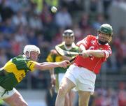 16 May 2004; Jerry O'Connor, Cork, in action against James McCarthy, Kerry. Guinness Munster Senior Hurling Championship, Cork v Kerry, Pairc Ui Chaoimh, Cork. Picture credit; Brendan Moran / SPORTSFILE