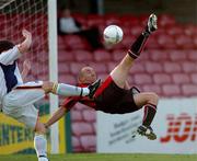 17 May 2004; Tony Grant, Bohemians, scores his sides first goal with an overhead kick, under pressure from David O'Sullivan, Drogheda United. eircom league, Premier Division, Bohemians v Drogheda United, Dalymount Park, Dublin. Picture credit; David Maher / SPORTSFILE