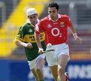 16 May 2004; Sean Og O'hAilpin, Cork, in action against James McCarthy, Kerry. Guinness Munster Senior Hurling Championship, Cork v Kerry, Pairc Ui Chaoimh, Cork. Picture credit; Brendan Moran / SPORTSFILE
