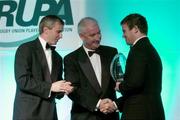 19 May 2004; Gordon D'Arcy receives the Players' Player of the Year Award from Gerry McQuaid, Commercial Dorector, O2 Ireland, centre, and Niall Woods, Chief Executive, IRUPA, at the O2 Irish Rugby Union Players Association Awards at the Burlington Hotel, Dublin. Picture credit; Brendan Moran / SPORTSFILE