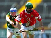 16 May 2004; Ben O'Connor, Cork, in action against Brendan Blackwell, Kerry. Guinness Munster Senior Hurling Championship, Cork v Kerry, Pairc Ui Chaoimh, Cork. Picture credit; Brendan Moran / SPORTSFILE