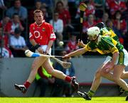 16 May 2004; Mickey O'Connell, Cork, in action against James McCarthy and Colin Harris, Kerry. Guinness Munster Senior Hurling Championship, Cork v Kerry, Pairc Ui Chaoimh, Cork. Picture credit; Brendan Moran / SPORTSFILE