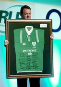 19 May 2004; Former Ireland rugby International Mick Galwey with Kevin Maggs' Triple Crown winning shirt during the auction at the O2 Irish Rugby Union Players Association Awards at the Burlington Hotel, Dublin. Picture credit; Brendan Moran / SPORTSFILE
